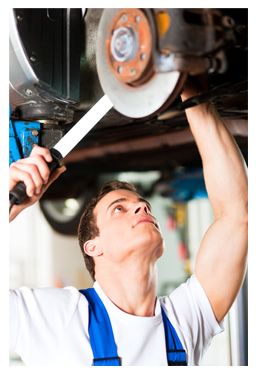 Mechanic Servicing Car